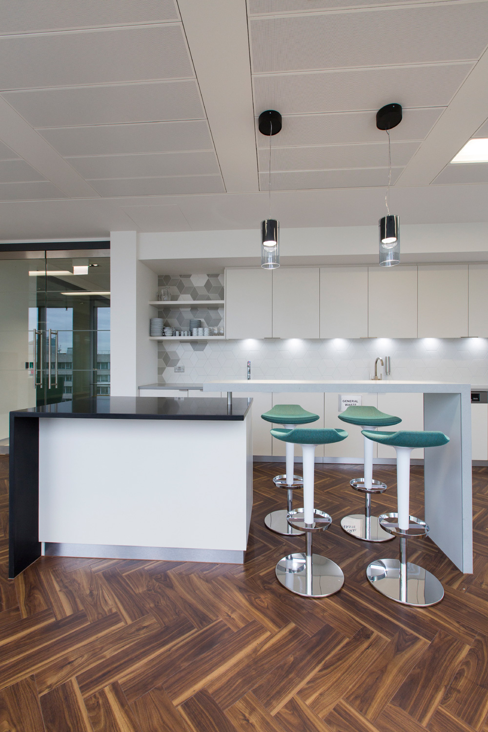 Monochromatic office interiors fit out in London - coffee bar