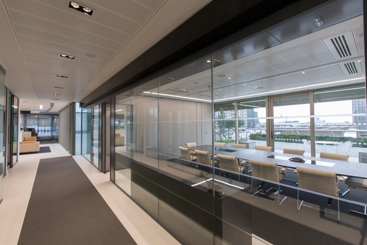 Monochromatic office interiors fit out in London - meeting suite