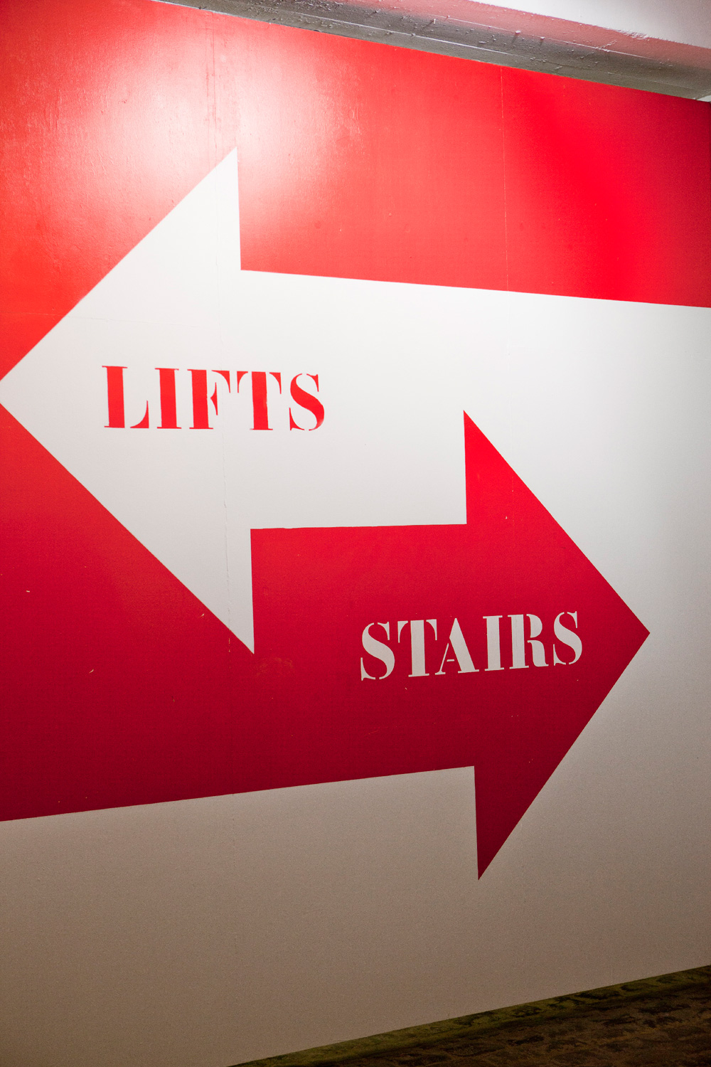 Industrial open plan office design - The Tea Building wayfinding signage