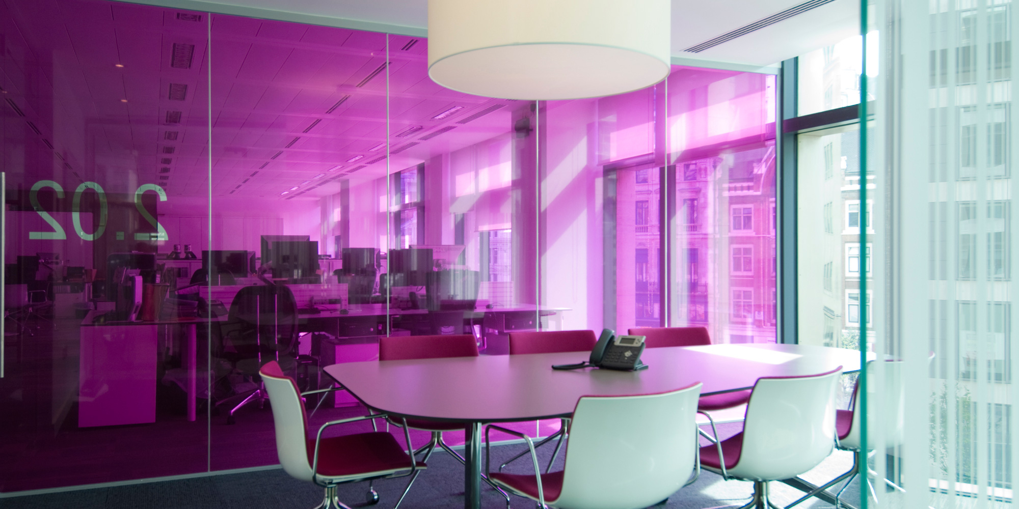 Workplace analysis and space planning - meeting room interior with coloured glass film