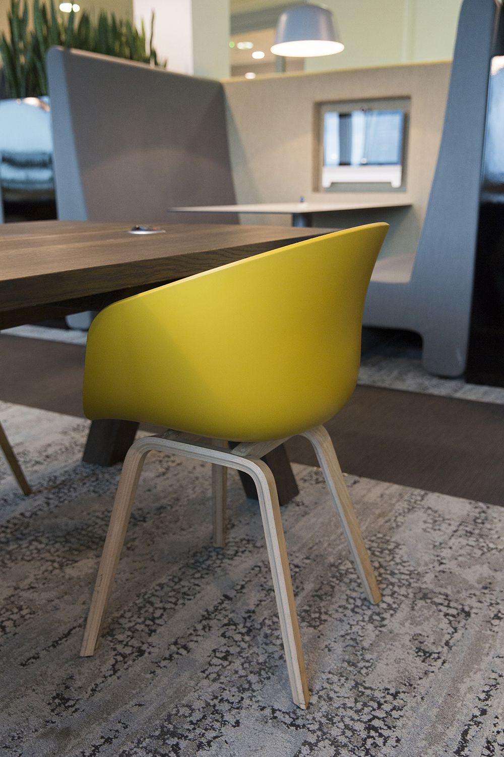 London headquarters interior architecture redesign - a mix of booth seating and tables and chairs for collborative working