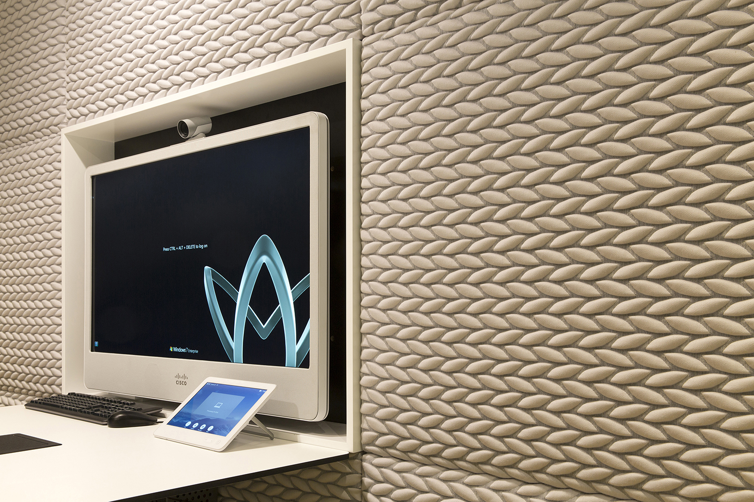 London headquarters interior architecture redesign - video conferencing room with feature 3D fabric wall