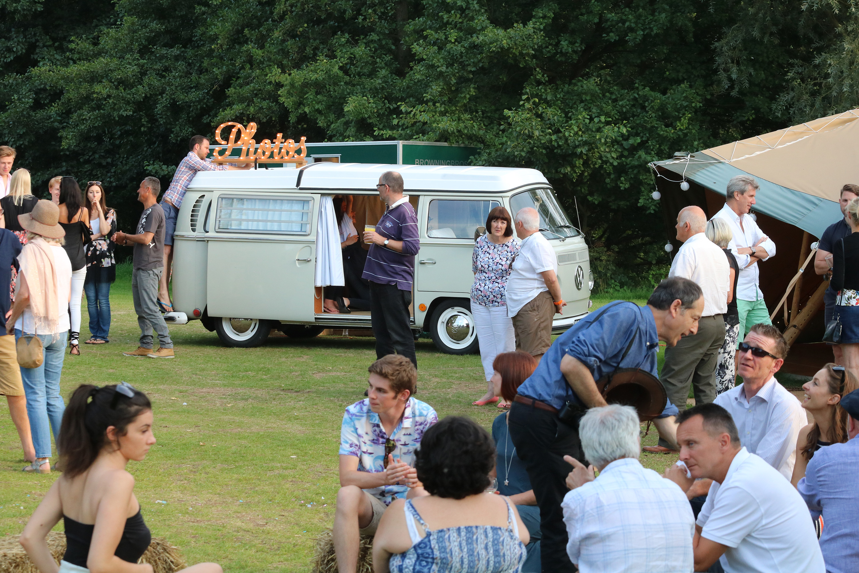 Mansfield Monk 25th anniversary celebrations - outdoor agthering of people by VW camper van photo booth